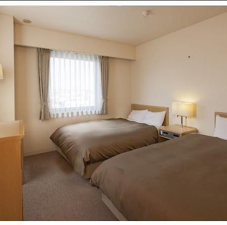 Hotel Glad One Minamiosaka Kamer foto